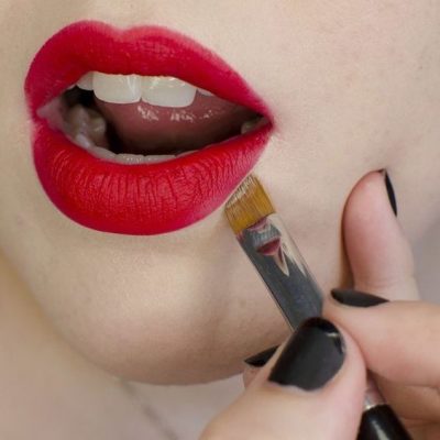 Applying A Lipstick